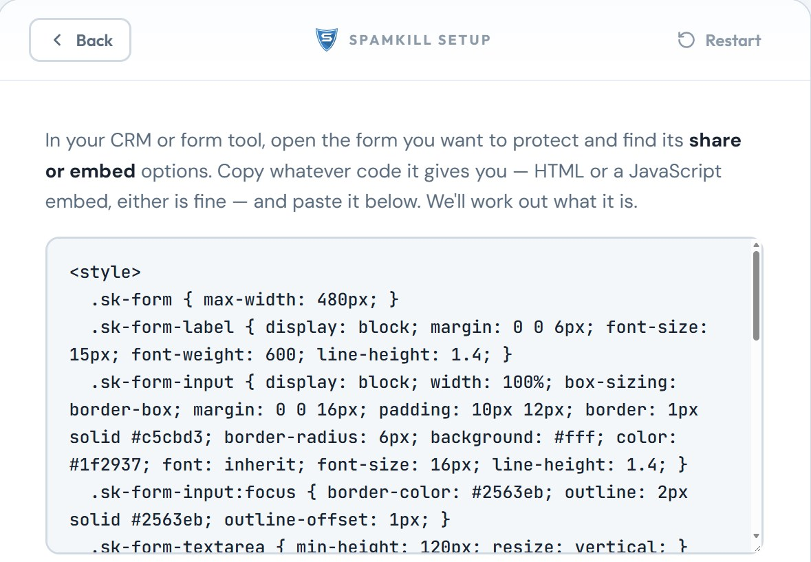 The Setup Wizard with the styled GetResponse form code pasted in the box, starting with its style block