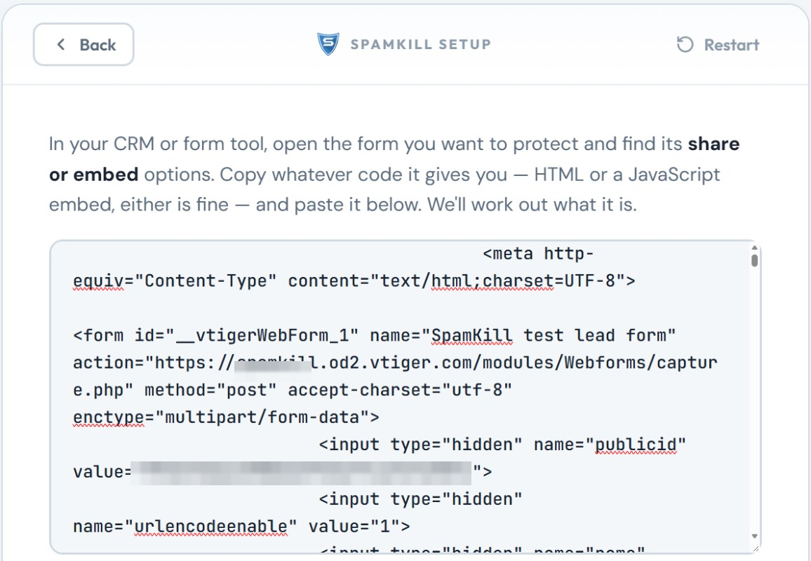 The Setup Wizard with Vtiger's webform code pasted in the box