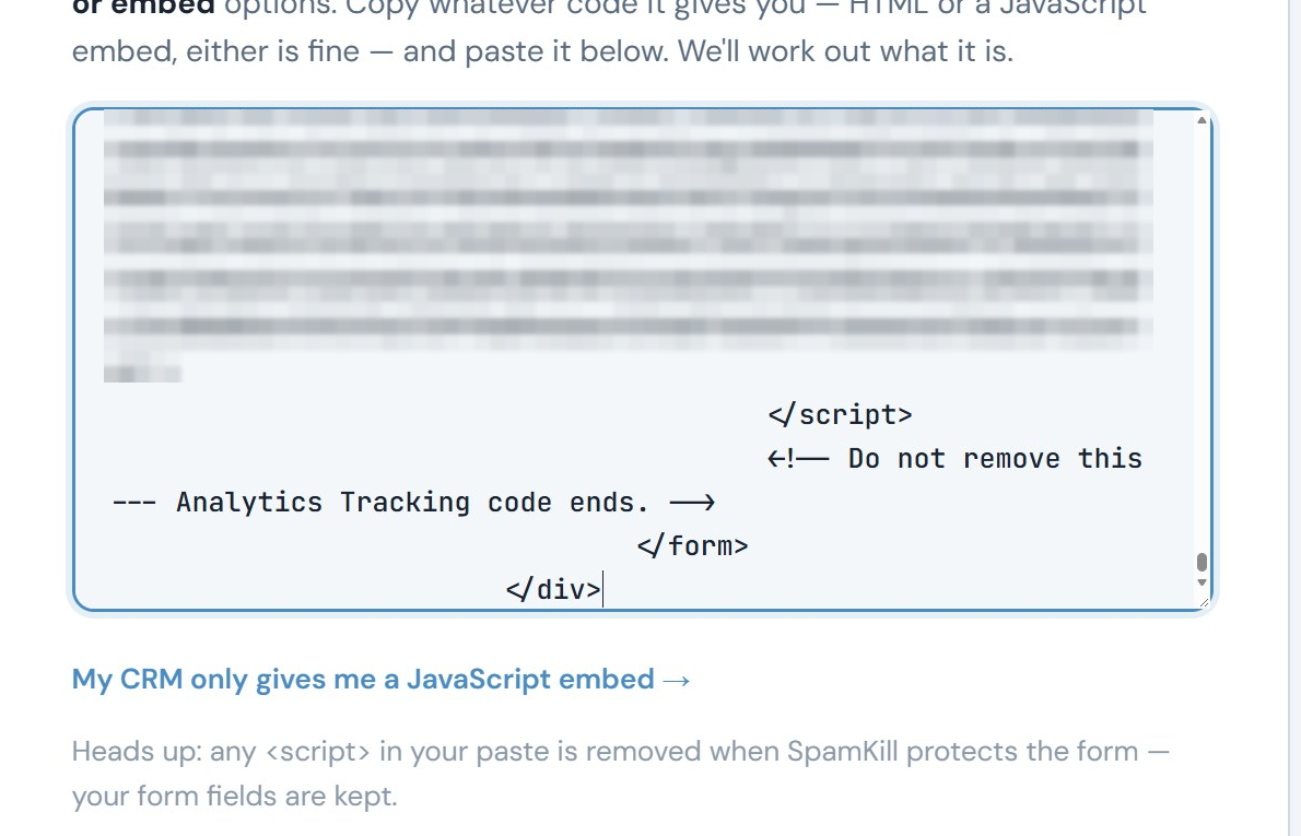 The Setup Wizard with Zoho's form code pasted in the box and a note underneath
